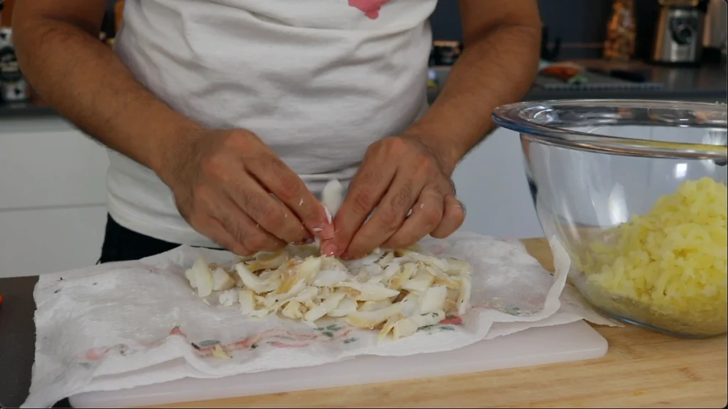 Desmenuzar el bacalao
