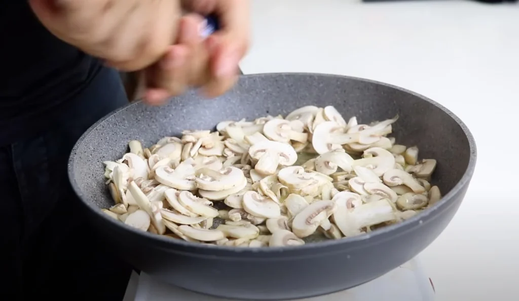 cocinar champiñones al ajillo